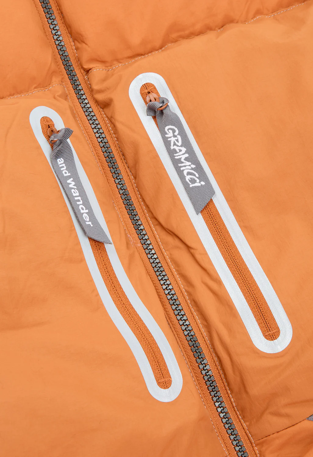 Gramicci x And Wander Down Jacket - ORANGE - Image 4